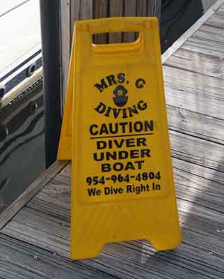 Mrs. G Diving- Caution Diver Under Boat
